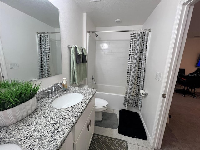 full bathroom with tile patterned flooring, vanity, shower / bath combination with curtain, and toilet