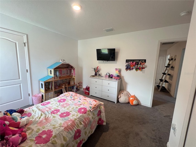 bedroom featuring dark colored carpet