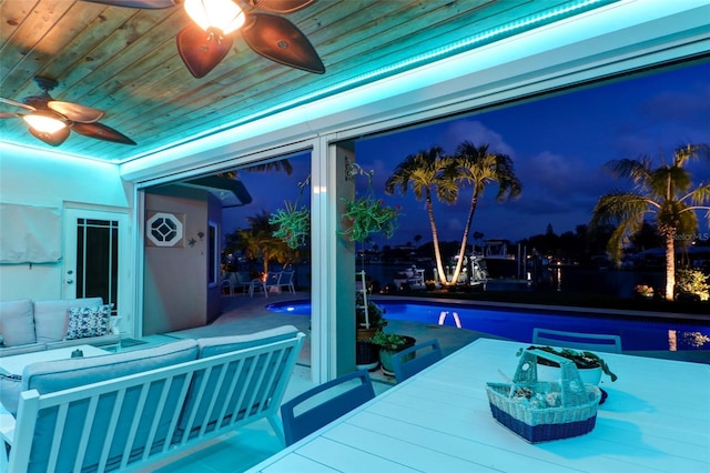 view of patio featuring outdoor lounge area and ceiling fan