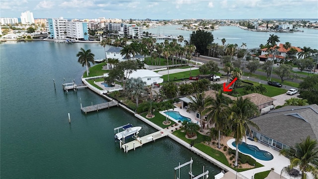 birds eye view of property featuring a water view