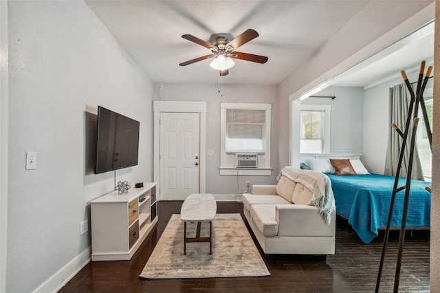 bedroom featuring cooling unit and ceiling fan