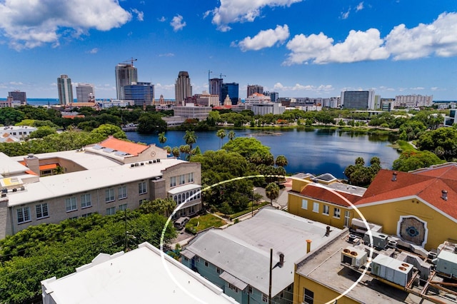 birds eye view of property with a water view