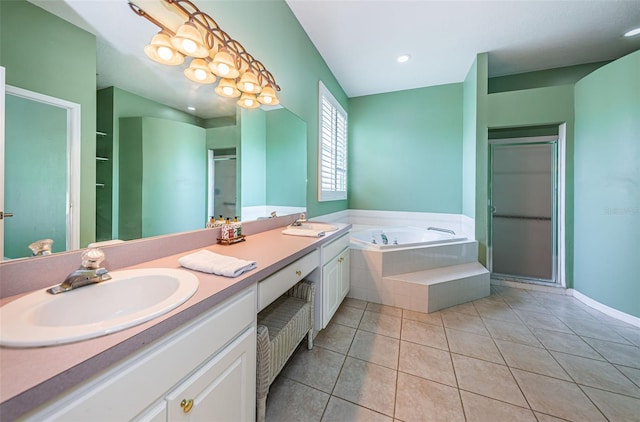 bathroom featuring a stall shower, a sink, a bath, and tile patterned floors