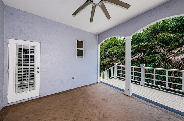 view of patio featuring a ceiling fan