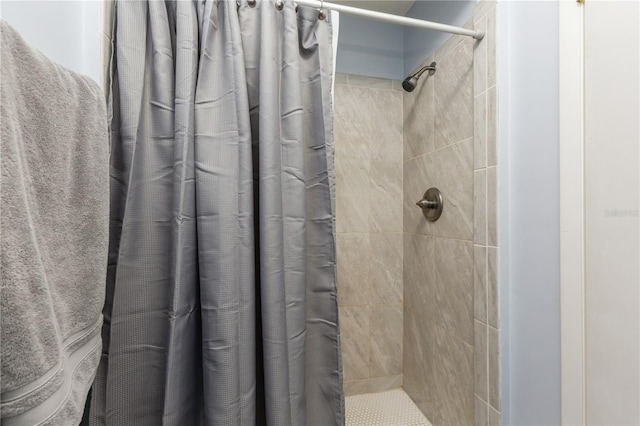 bathroom with a shower with shower curtain