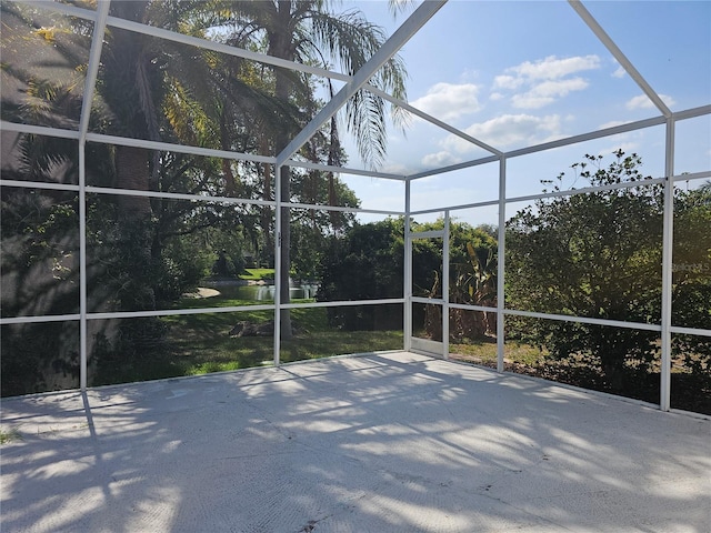 view of patio / terrace with a lanai