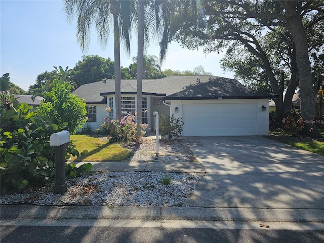 single story home featuring a garage