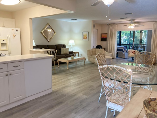 dining room with light wood-type flooring