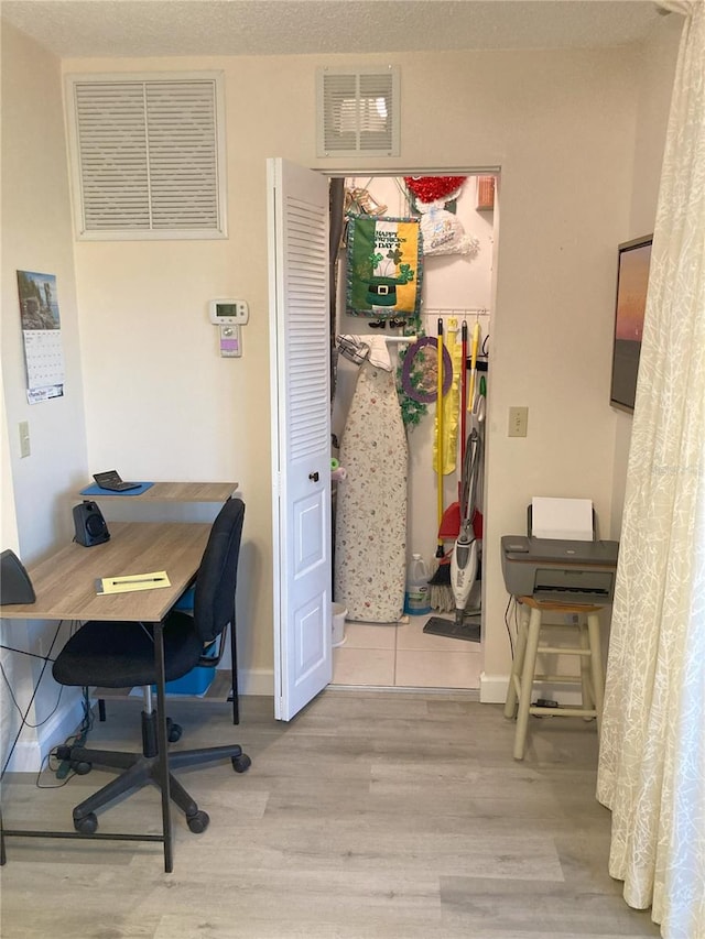 office space featuring light wood-type flooring