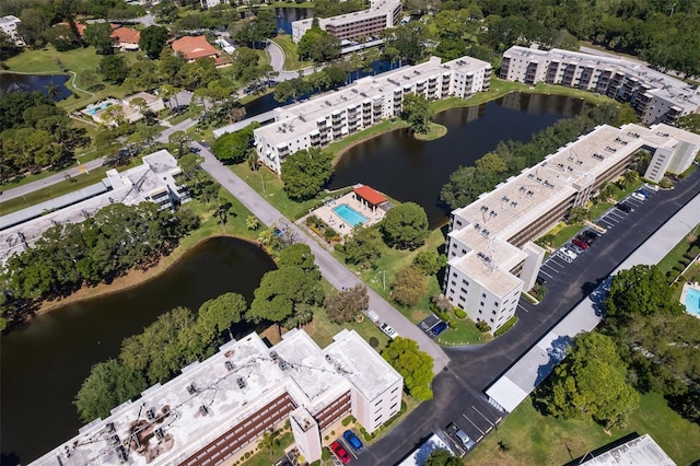 drone / aerial view with a water view