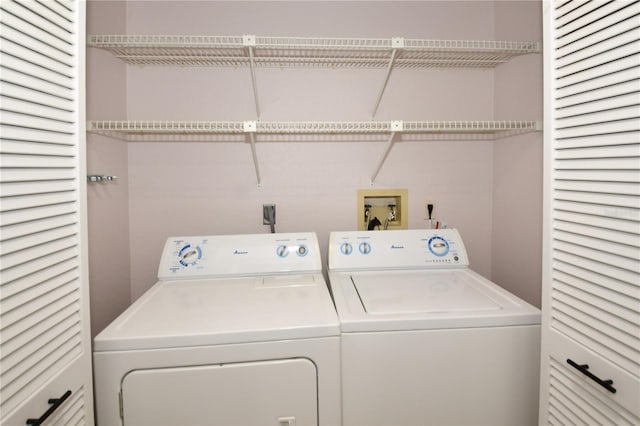 laundry area featuring washing machine and dryer