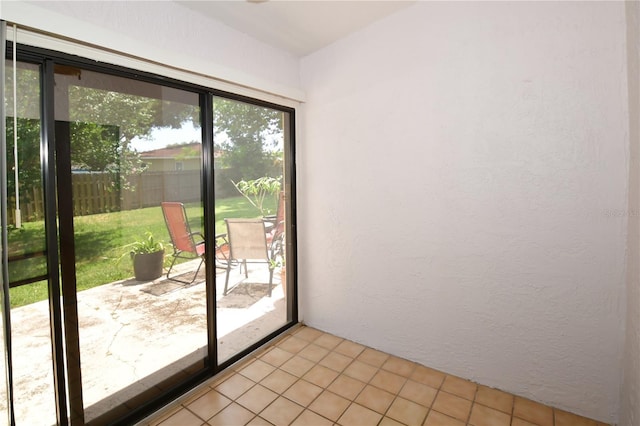 entryway featuring light tile patterned floors