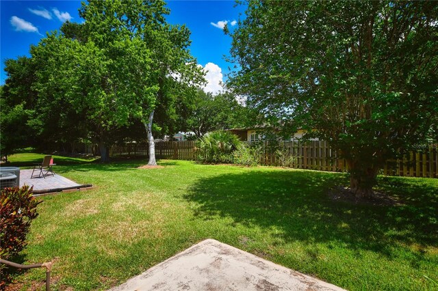 view of yard featuring a wooden deck