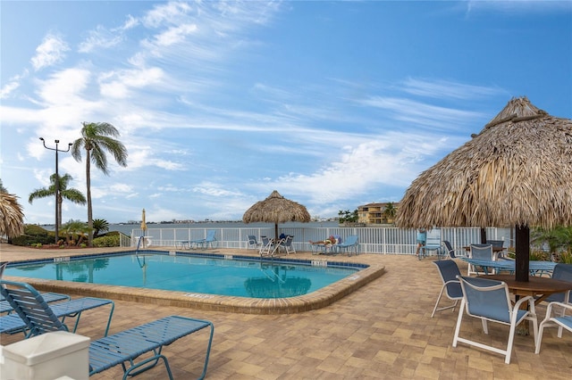 view of swimming pool featuring a patio area