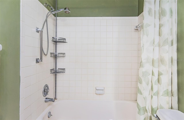 bathroom featuring shower / tub combo with curtain