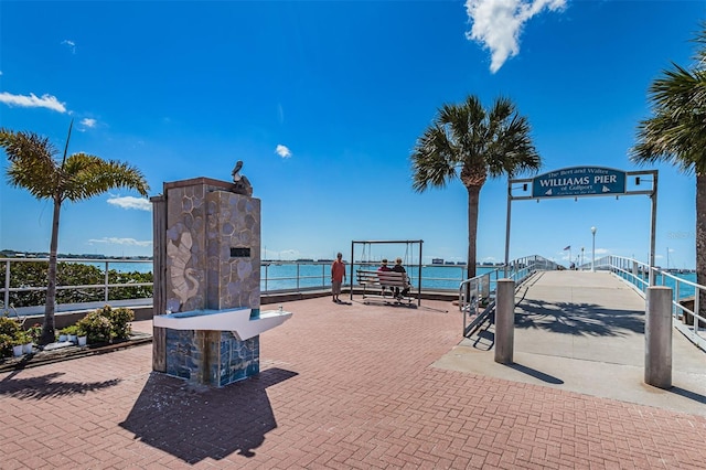 view of property's community featuring a water view