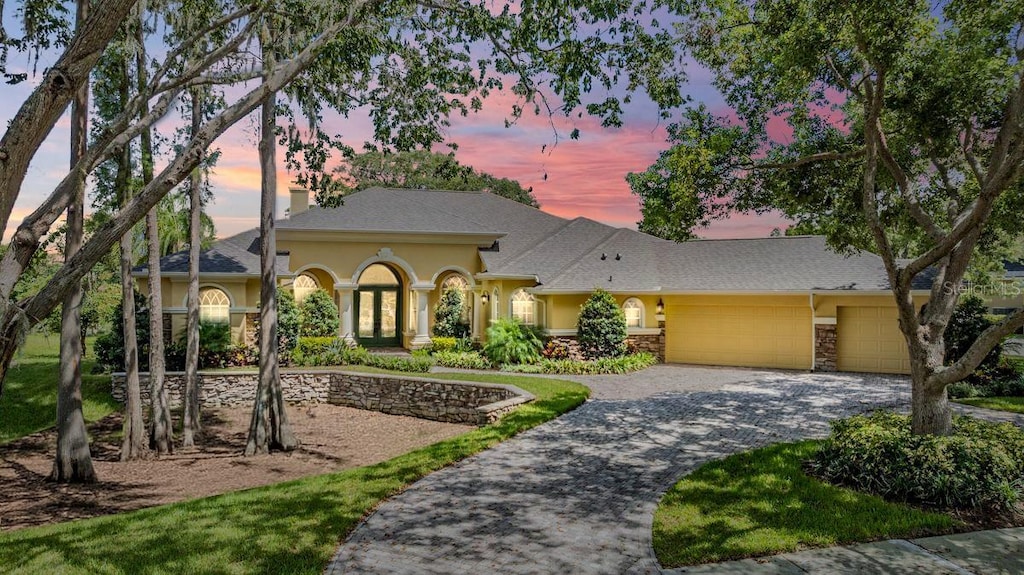 view of front of property featuring a garage