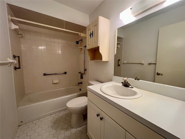 full bathroom featuring shower / bath combination, vanity, and toilet