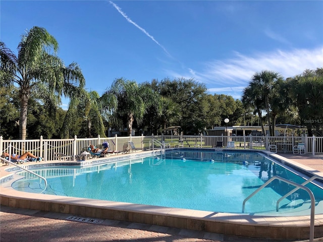 community pool with fence