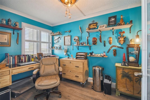 office featuring a textured ceiling, wood finished floors, and crown molding