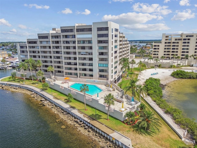 6035 Sea Ranch Dr Unit 505, Hudson, FL 34667 - drone / aerial view of a pool area, a large body of water, and apartment complex / building