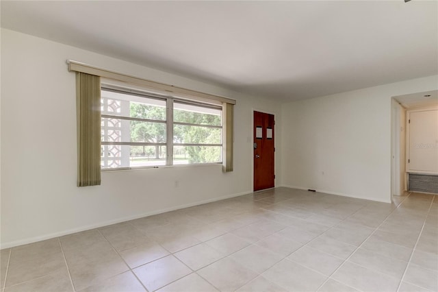 view of tiled spare room