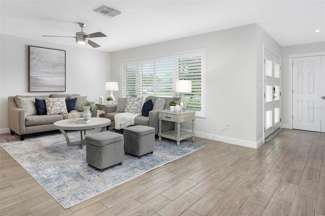 living room featuring ceiling fan