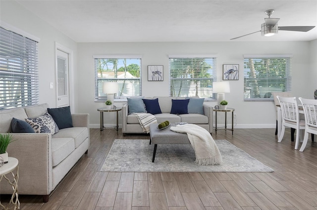 living room featuring ceiling fan