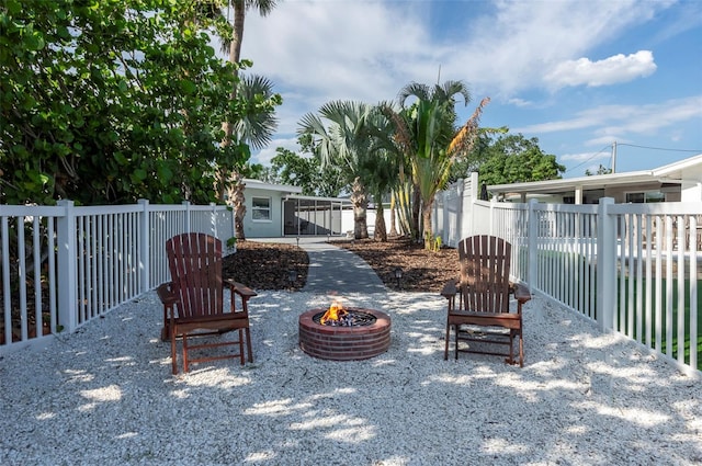 view of patio featuring a fire pit