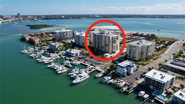 birds eye view of property with a water view