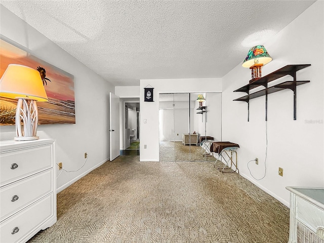 unfurnished bedroom featuring a closet and a textured ceiling