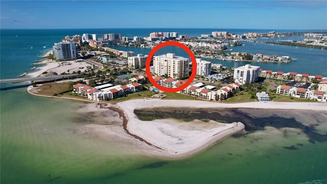 bird's eye view with a view of the beach and a water view