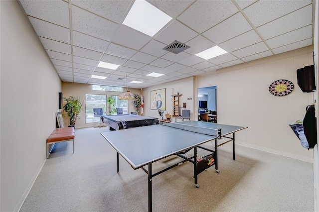 playroom with light carpet, a paneled ceiling, and billiards