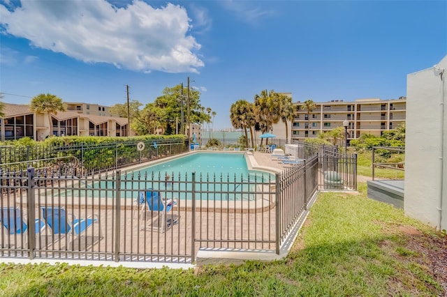 view of swimming pool with a patio area