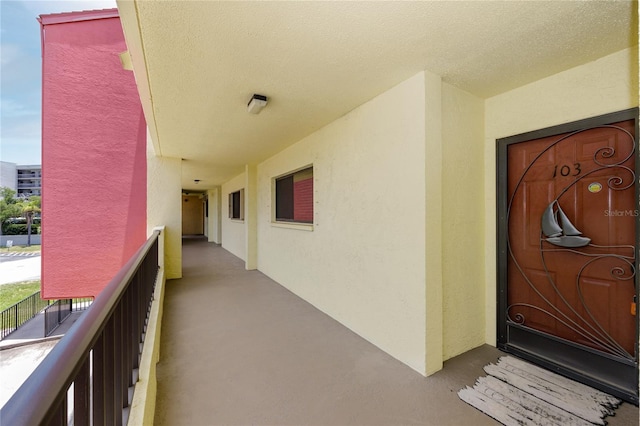 doorway to property with a balcony