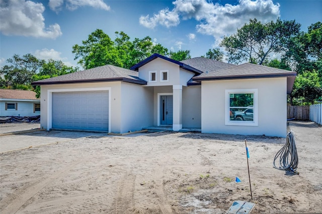 view of front of home featuring a garage