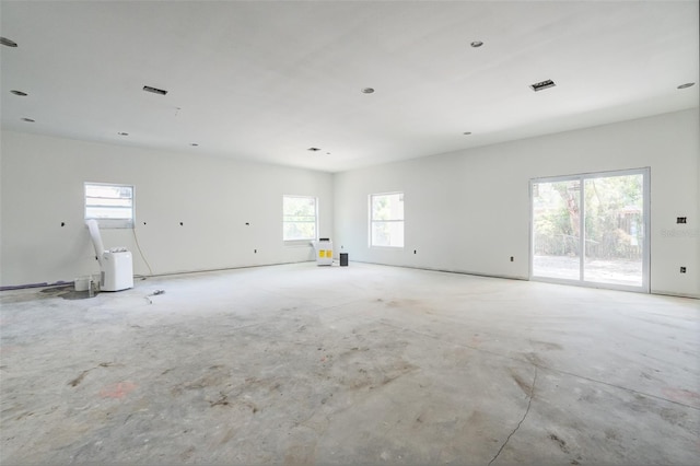 empty room featuring a wealth of natural light