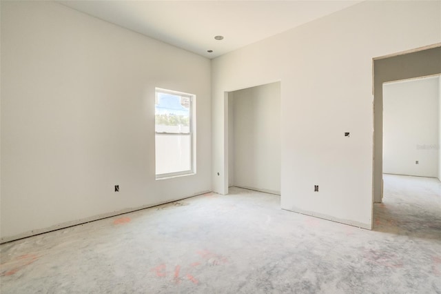 spare room with light colored carpet