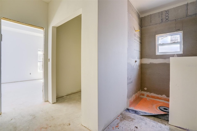 bathroom with concrete floors