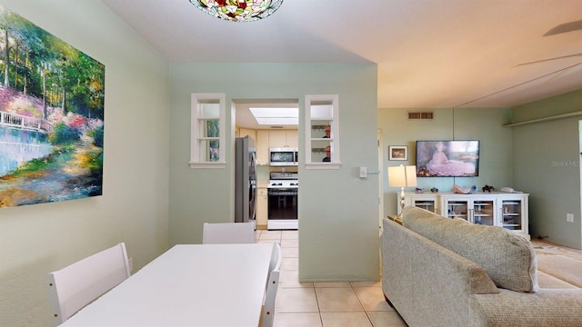 view of tiled dining space