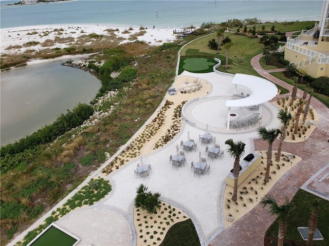 aerial view featuring a water view and a view of the beach