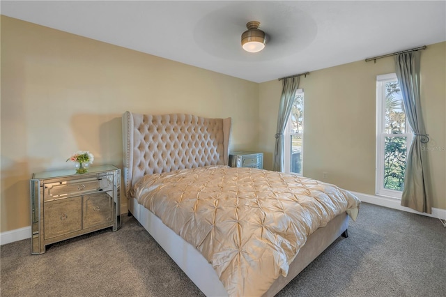 bedroom with ceiling fan and carpet