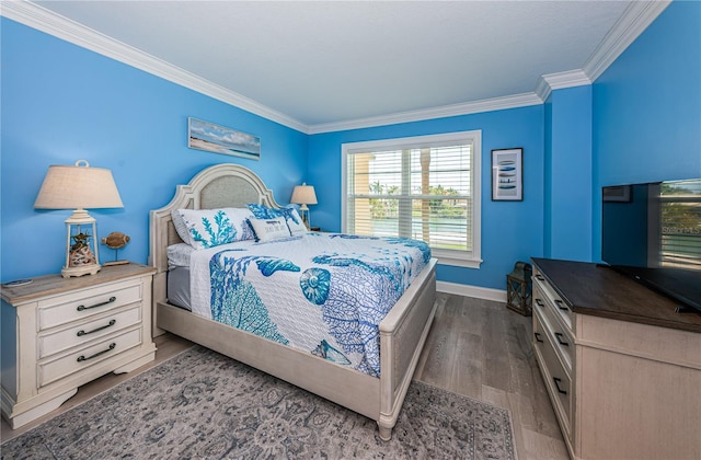 bedroom featuring wood-type flooring and ornamental molding