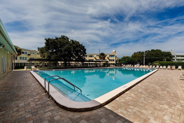 view of swimming pool featuring a patio