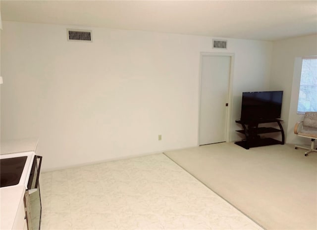 living room with light colored carpet