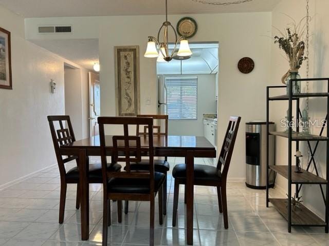 dining room with an inviting chandelier