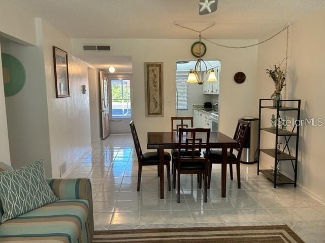 view of tiled dining space