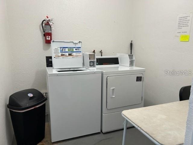 laundry area featuring independent washer and dryer