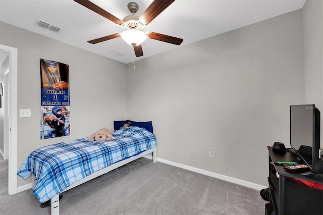 carpeted bedroom with ceiling fan