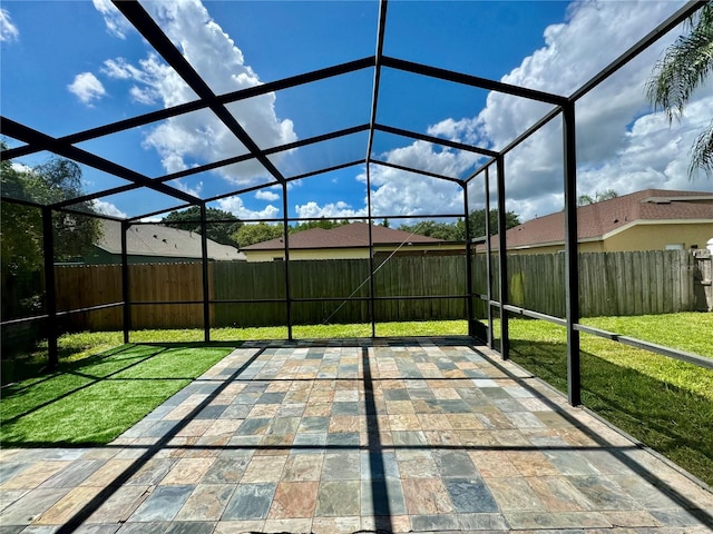 unfurnished sunroom with lofted ceiling